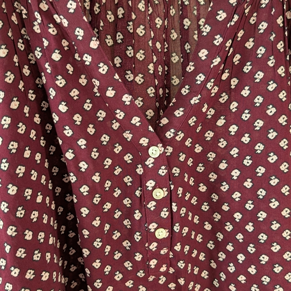 Floral Smocked Wrist Henley with 1/4 Button Down Closure In Plum - Picture 6 of 8